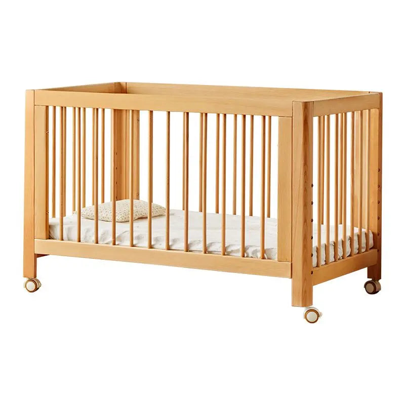 Lit bébé réglable en hêtre – Modèle convertible et sécurisé