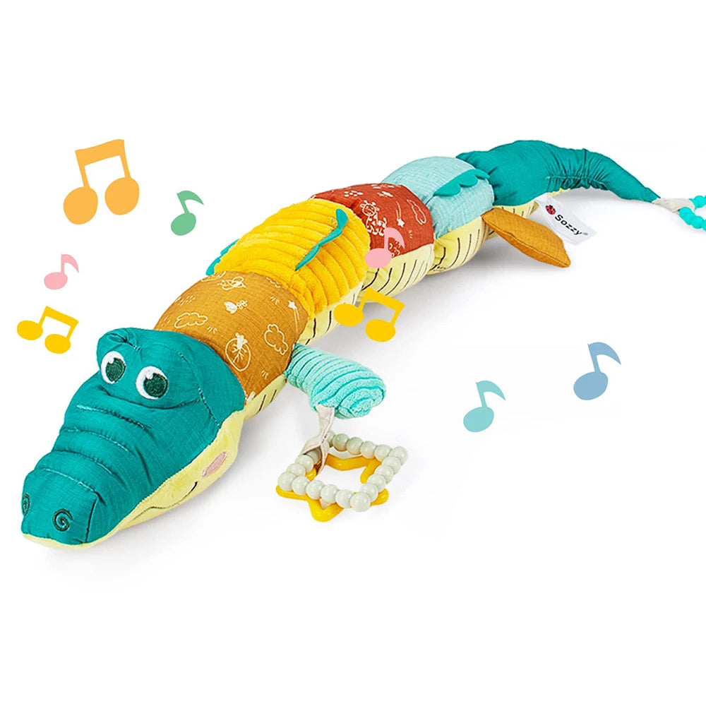 Peluche musicale pour bébé avec anneau de dentition à clochette.