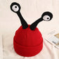 Bonnet de bébé rouge tricoté pour le Nouvel An