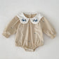 Barboteuse d'automne douillette pour tout-petit avec broderie florale