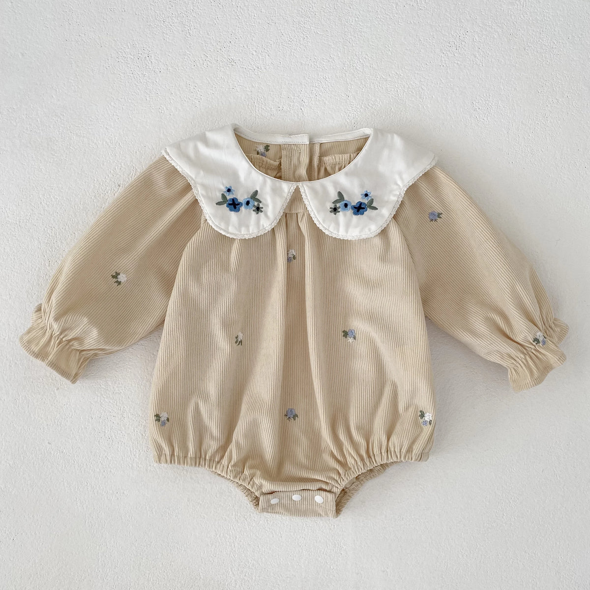 Barboteuse d'automne douillette pour tout-petit avec broderie florale