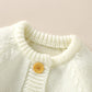 Ensemble combinaison et bonnet tricotés pour bébé