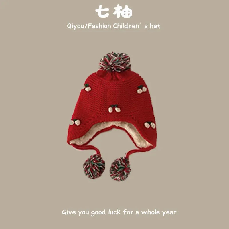 Bonnet de bébé rouge tricoté pour le Nouvel An