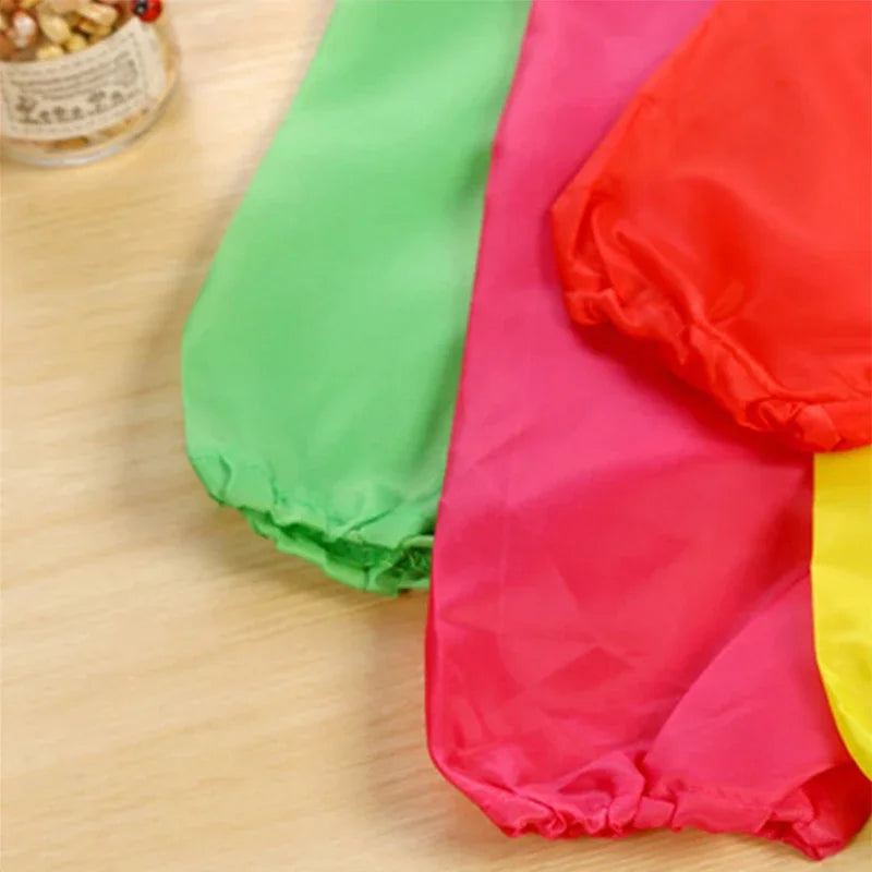 Bavoir-salopette imperméable à manches longues pour bébé
